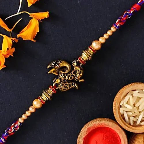Ganesha Rakhi & Cadbury Silk In Best Bro Sleeve
