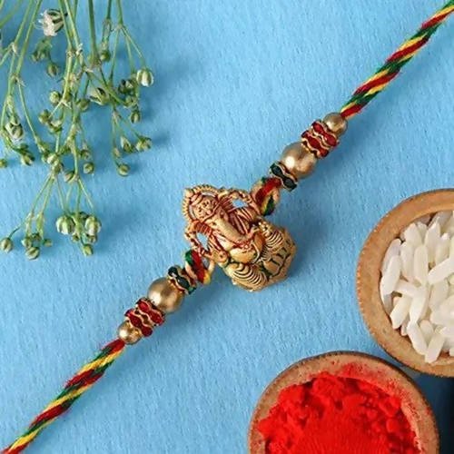 Authentic Design Ganesha Rakhi & Fruit N Nut Chocolates