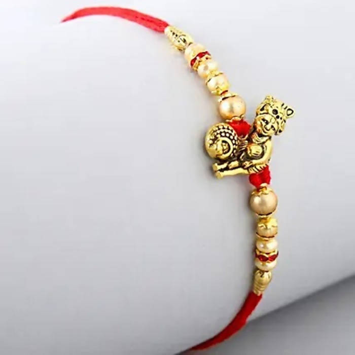 Divine Lord Krishna Pearl Rakhi & Cadbury Fruit N Nut