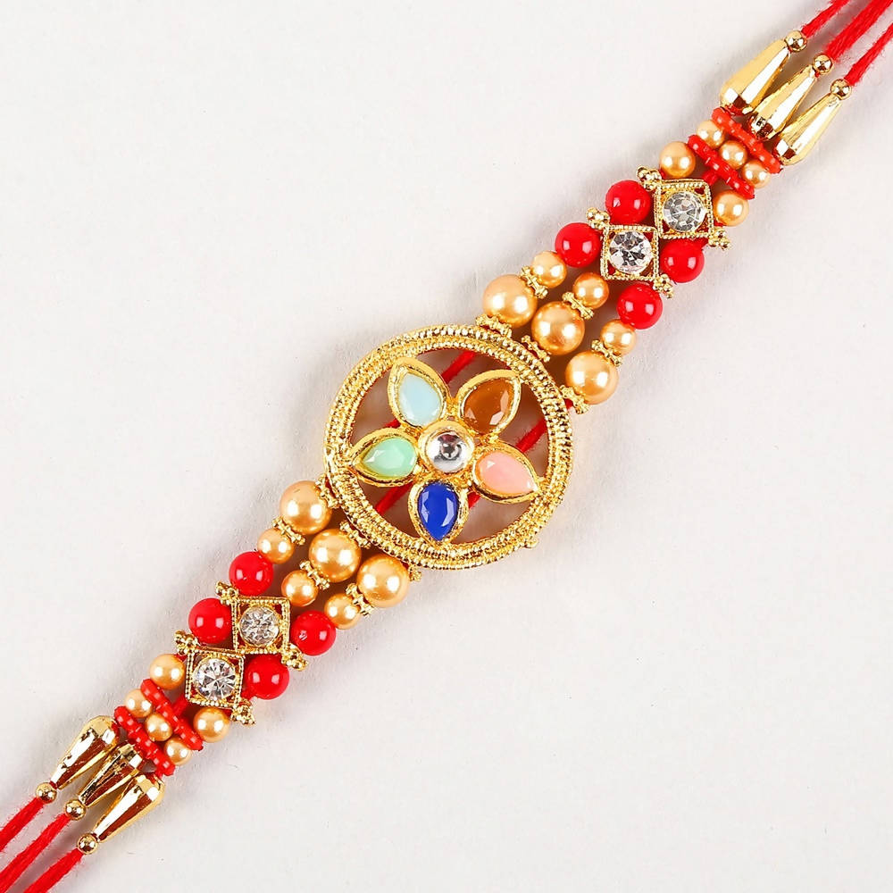 Flower Design Kundan Rakhi and Kaju Rolls Box