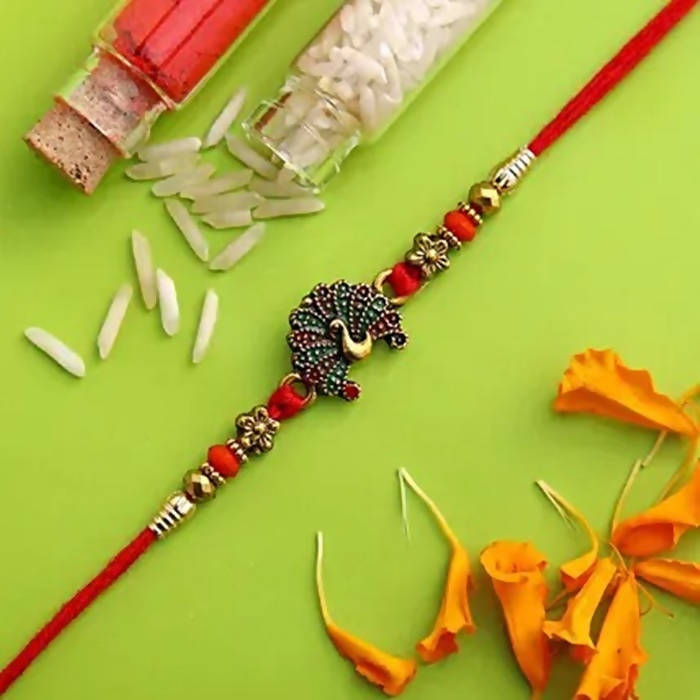 Beautiful Peacock Ethnic Rakhi & Cadbury Temptations