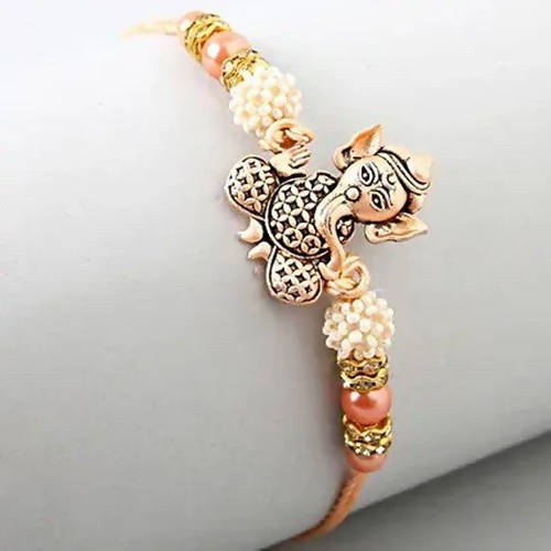 Holy Ganesha Rakhi & 16 Pcs Ferrero Rocher