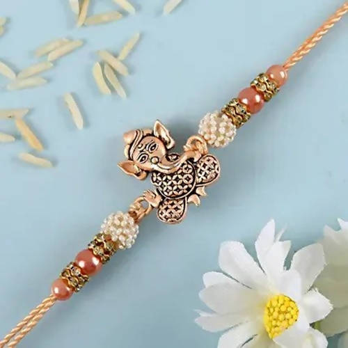 Enticing Ganesha Rakhi & Cadbury 5 Star