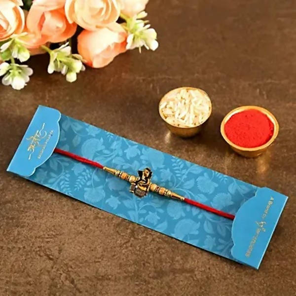 Devotional Lord Ganesha Rakhi & 2 Dairy Milk Silk