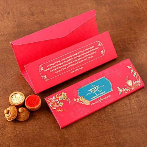 Beautiful Ganesha Rakhi and Almonds Jar
