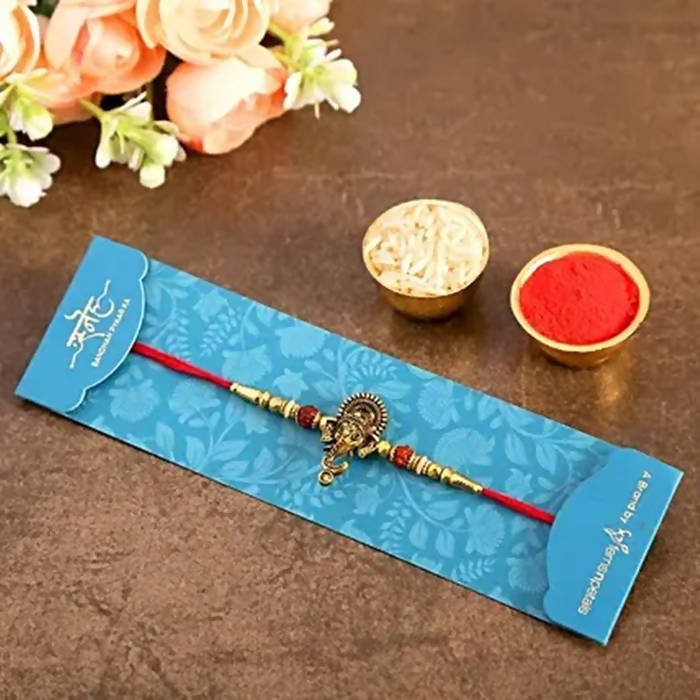 Lord Ganesha Rudraksha Rakhi & 2 Dairy Milk Silk