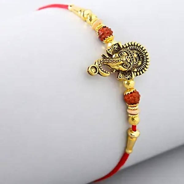 Lord Ganesha Rudraksha Rakhi & 2 Dairy Milk Silk