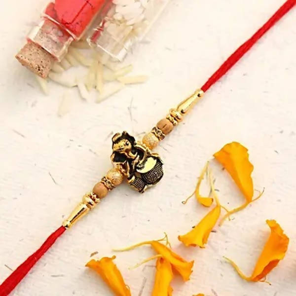Devotional Lord Ganesha Rakhi & 2 Dairy Milk Silk