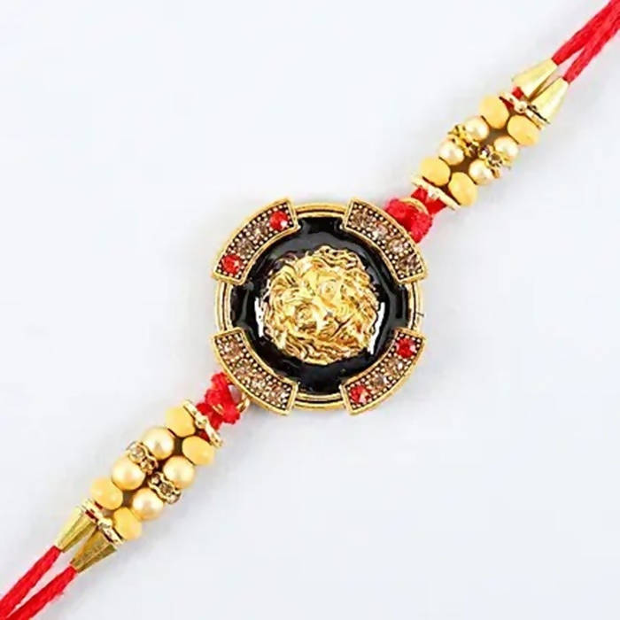 Traditional Lion Face Rakhi & Kaju Roll Box