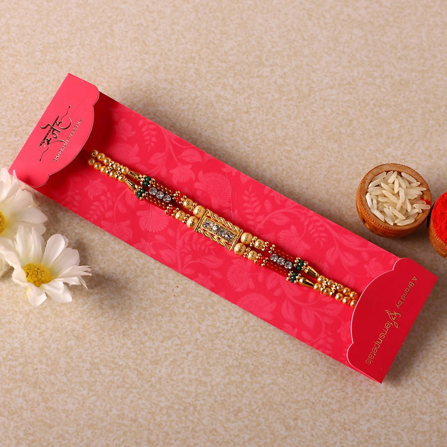 Dainty Kundan Rakhi And Dairy Milk Silk Chocolates