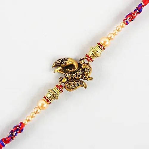 Ganesha Rakhi & Cadbury Silk In Mera Bhai Sleeve