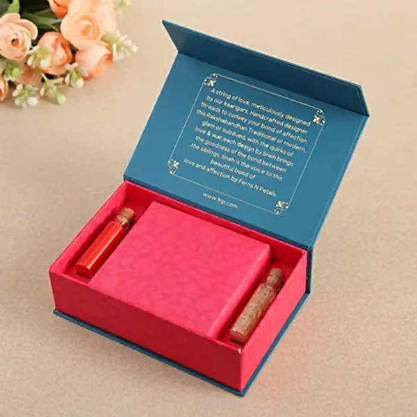 Om Pearl Bracelet Rakhi & Fruit N Nut Chocolates