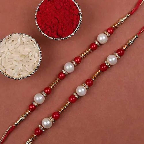 Set of 2 Pearl Rakhis With Cadbury Celebrations