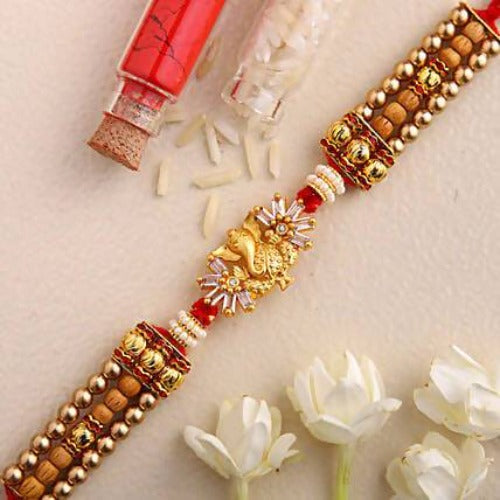 Ganesha Design Rakhi and Cashew Jar