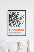 Typography poster mounted above sofa