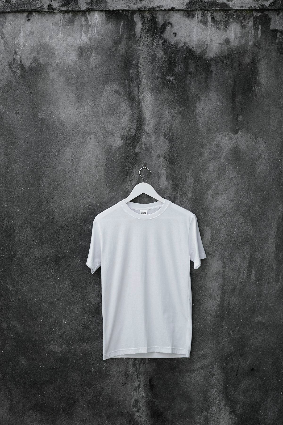 White crew neck t-shirt on gray