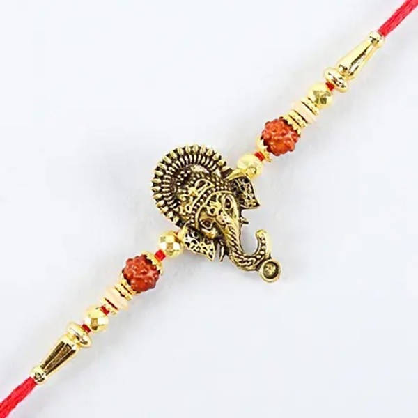 Lord Ganesha Rudraksha Rakhi & Kaju Roll Box